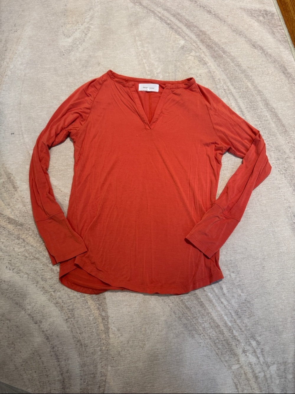 Dear John Long-Sleeve Split V-Neck Top in Rust Orange